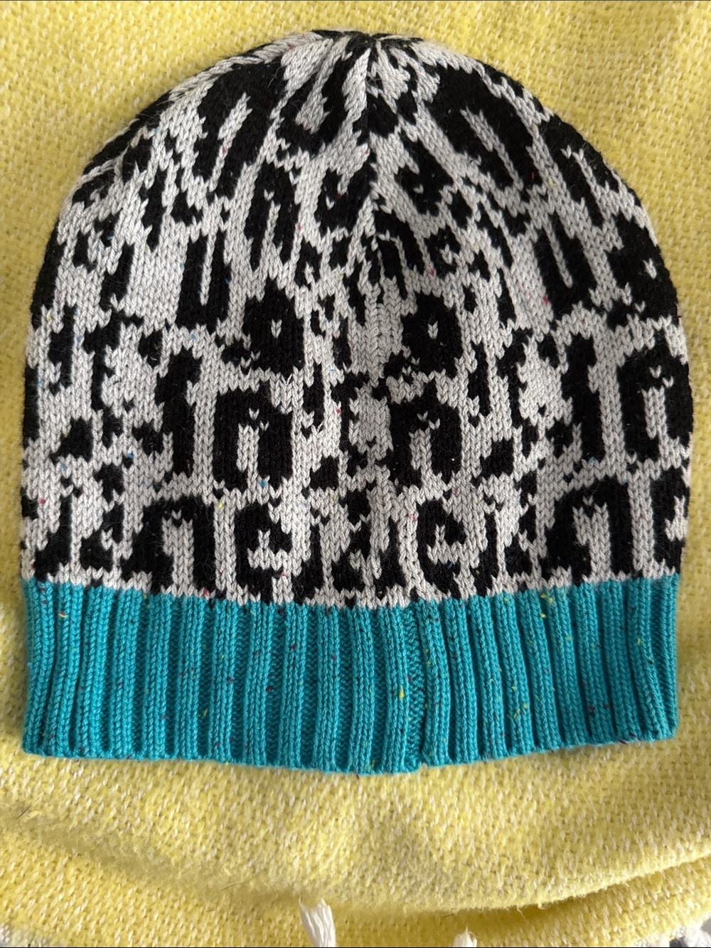 Anthropologie The Endery Black and White Leopard Beanie with Teal Trim